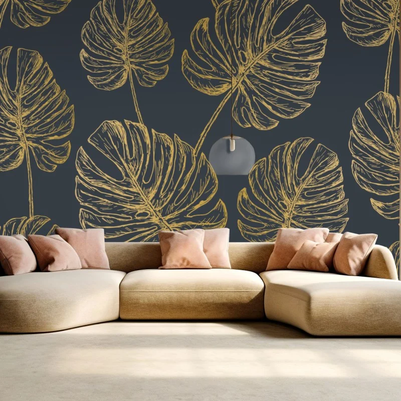 Wall mural gold monstera leaves on dark background