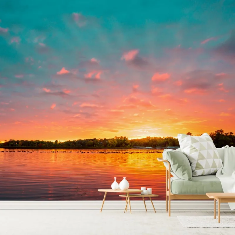 Wall mural turquoise sunset over tranquil lake