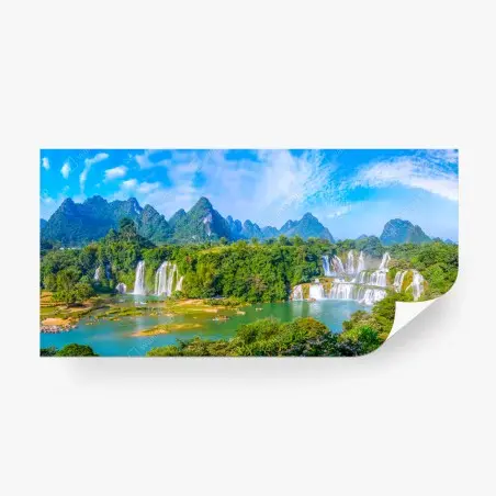 Wall mural lush waterfall panorama with karst mountains • Wallissimo®