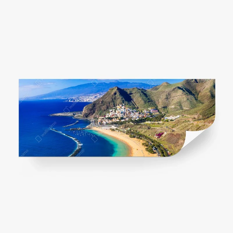 Wall mural sunlit coastal bay with turquoise waters