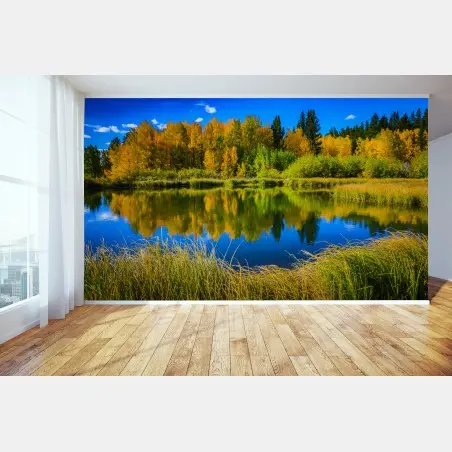 Wall mural autumn trees reflected on a glassy lake • Wallissimo®