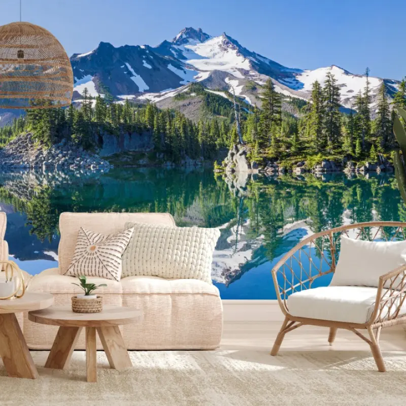 Wall mural serene alpine lake with mirrored mountains
