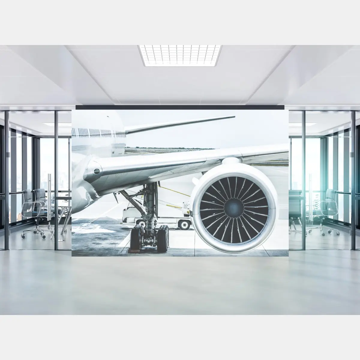 Wall mural close-up of jet engine at terminal • Wallissimo®