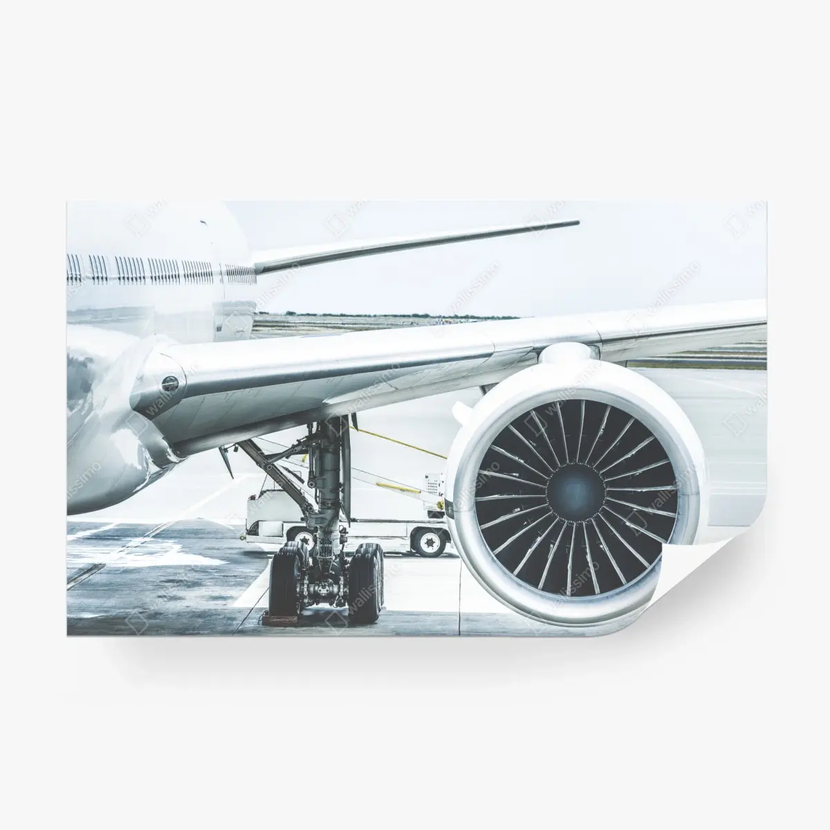 Wall mural close-up of jet engine at terminal • Wallissimo®