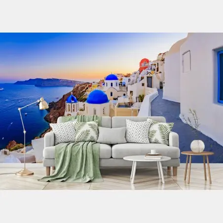 Wall mural Santorini sunset over blue domes • Wallissimo®