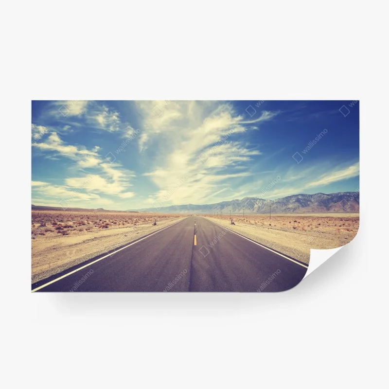 Wall mural vintage country highway under vast sky