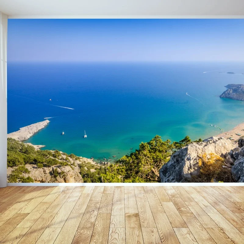 Wall mural sunlit turquoise bay panorama