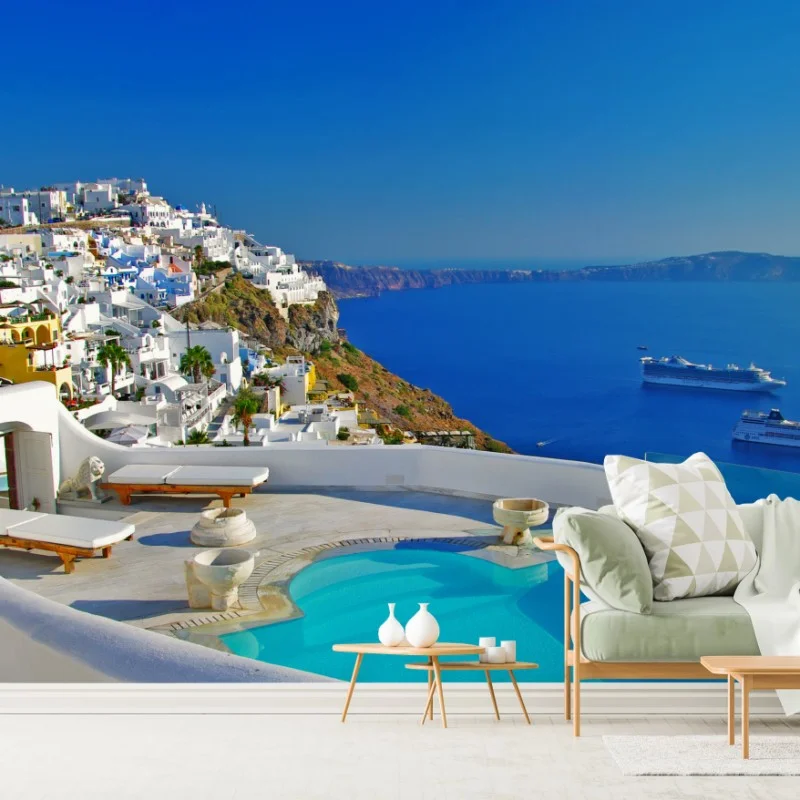 Wall mural Santorini cliffside sea view with pool