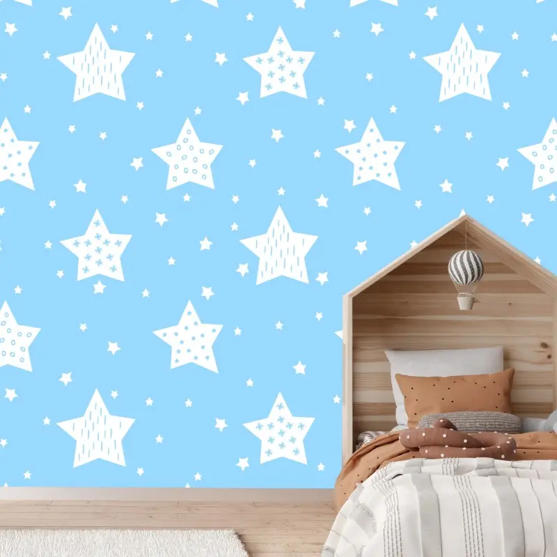 Wall mural soft blue stars for nursery wall