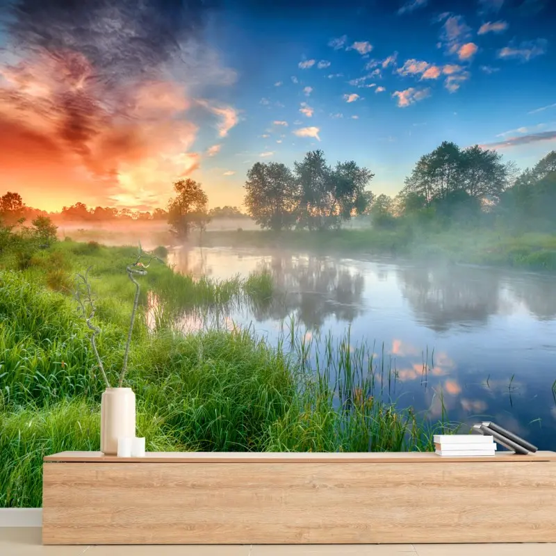 Wall mural sunrise mist over riverbanks