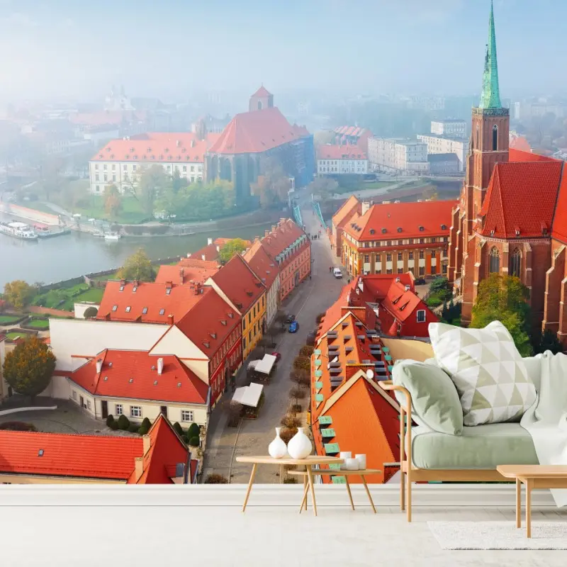 Wall mural misty european cityscape with red rooftops