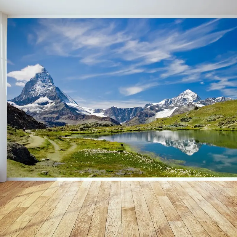 Wall mural majestic alpine lake with mountain reflection