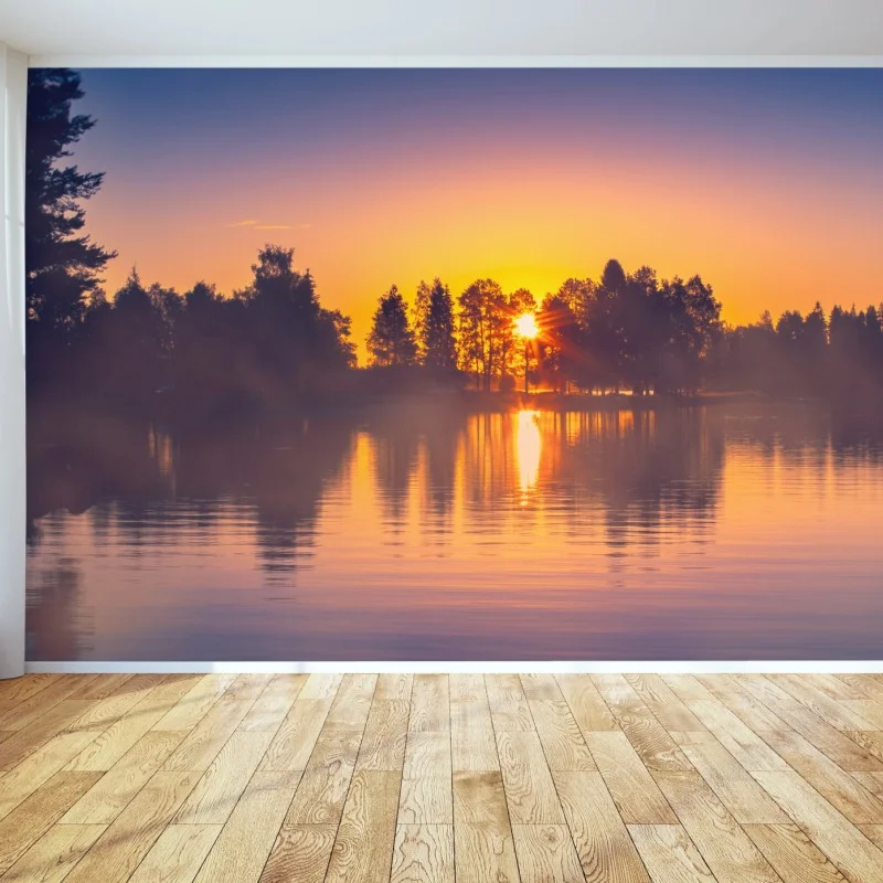 Wall mural misty lakeside sunset reflections