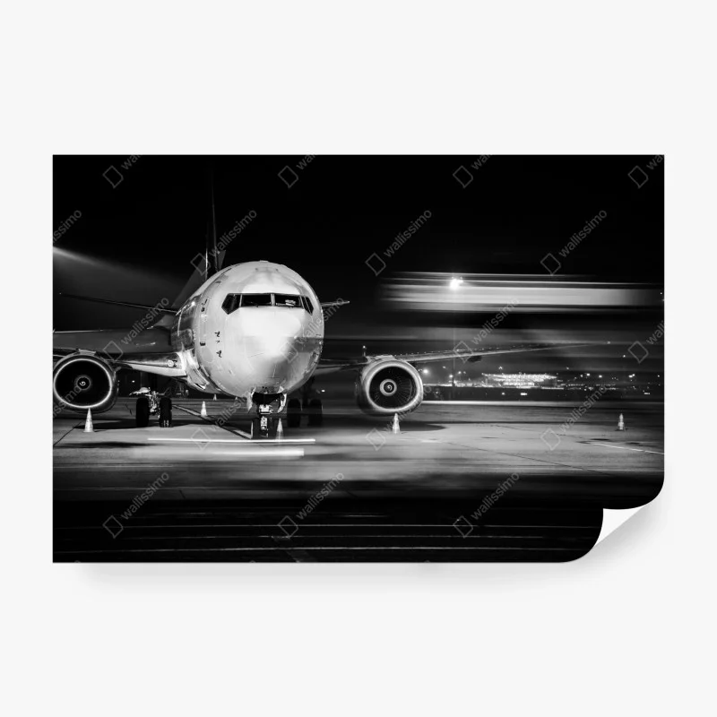 Wall mural monochrome jet on the tarmac at night