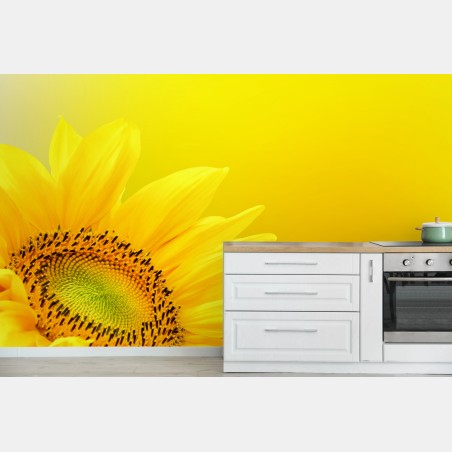 Wall mural vibrant sunflower close-up on yellow background • Wallissimo®