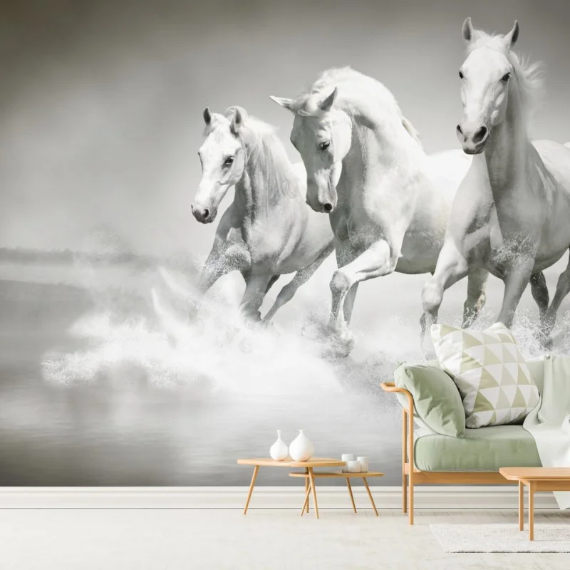 Wall mural three white horses running through water