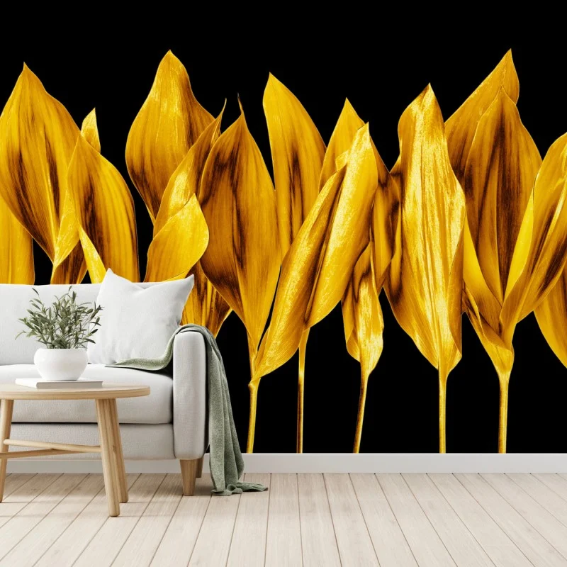 Wall mural golden leaves on black background