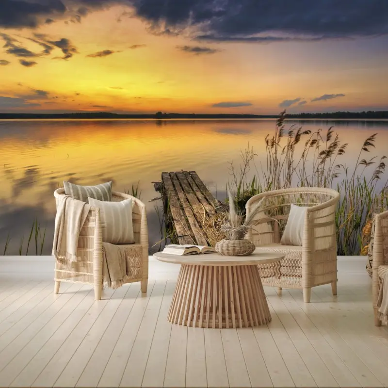 Wall mural golden lake sunset over a quiet dock