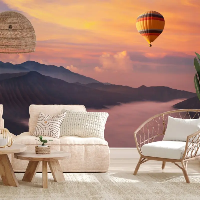Wall mural sunrise balloon over misty mountains