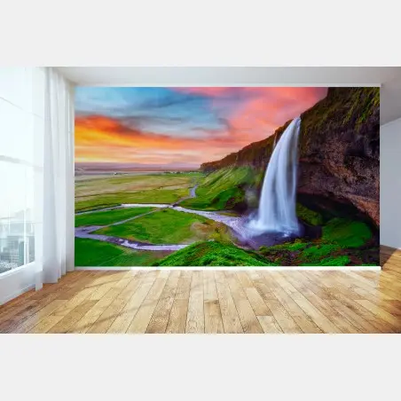 Wall mural Seljalandsfoss waterfall at sunset • Wallissimo®