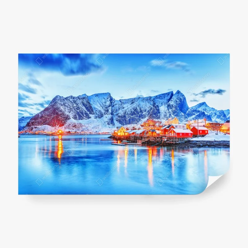 Wall mural snowy coastal village beneath towering mountains