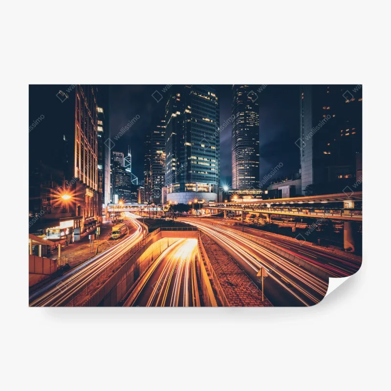 Wall mural night city light trails over urban highway