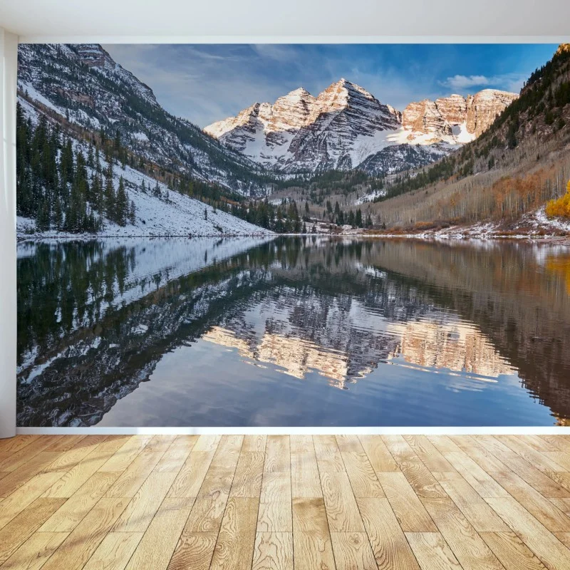 Wall mural serene alpine lake reflecting snow-covered peaks and autumn trees