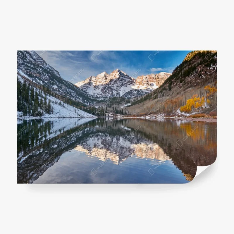 Wall mural serene alpine lake reflecting snow-covered peaks and autumn trees