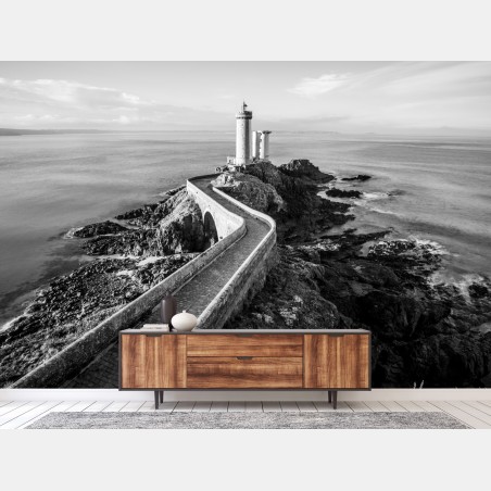 Wall mural lighthouse on rocky coast pathway • Wallissimo®
