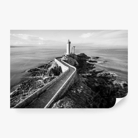 Wall mural lighthouse on rocky coast pathway • Wallissimo®