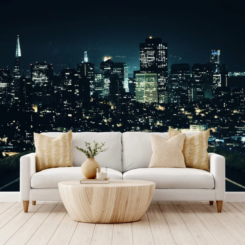 Wall mural road to illuminated city skyline at night