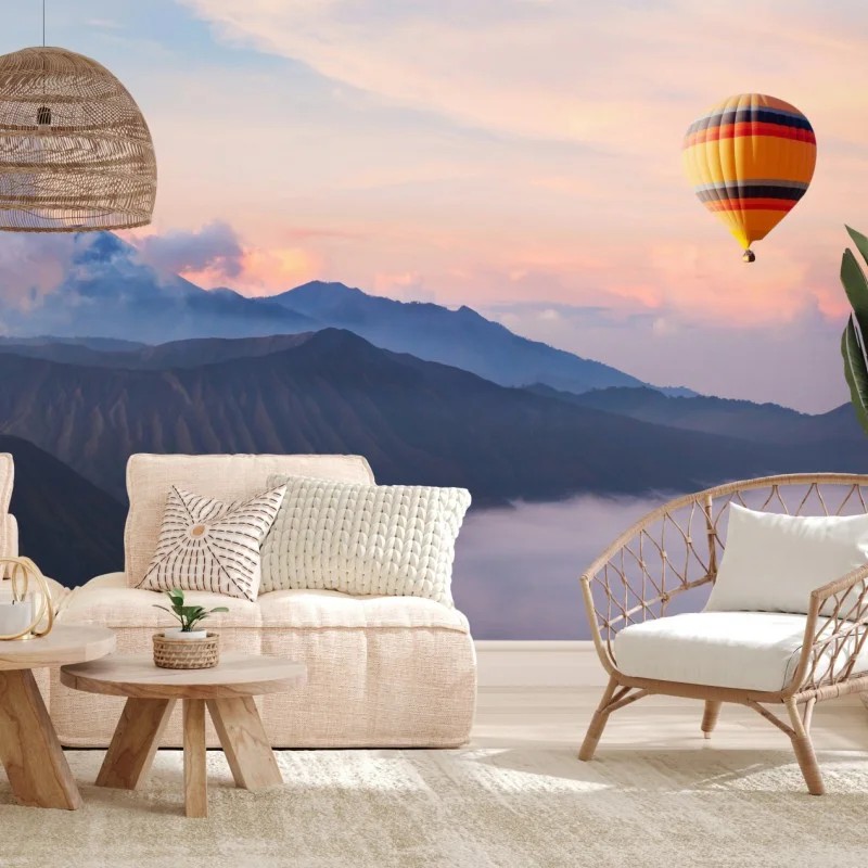 Wall mural hot air balloon over misty mountains