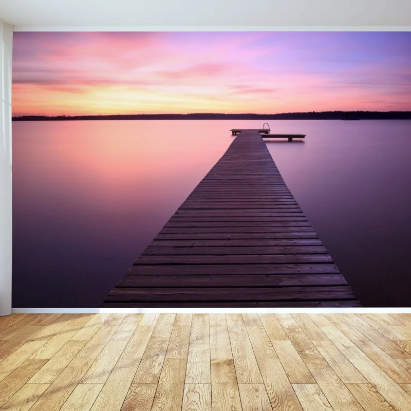 Wall mural tranquil pastel sunset over lake pier