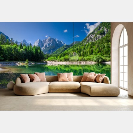 Wall mural alpine lake reflection in green mountains • Wallissimo®