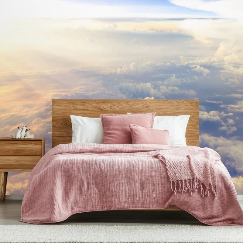 Wall mural sunlit clouds above the horizon