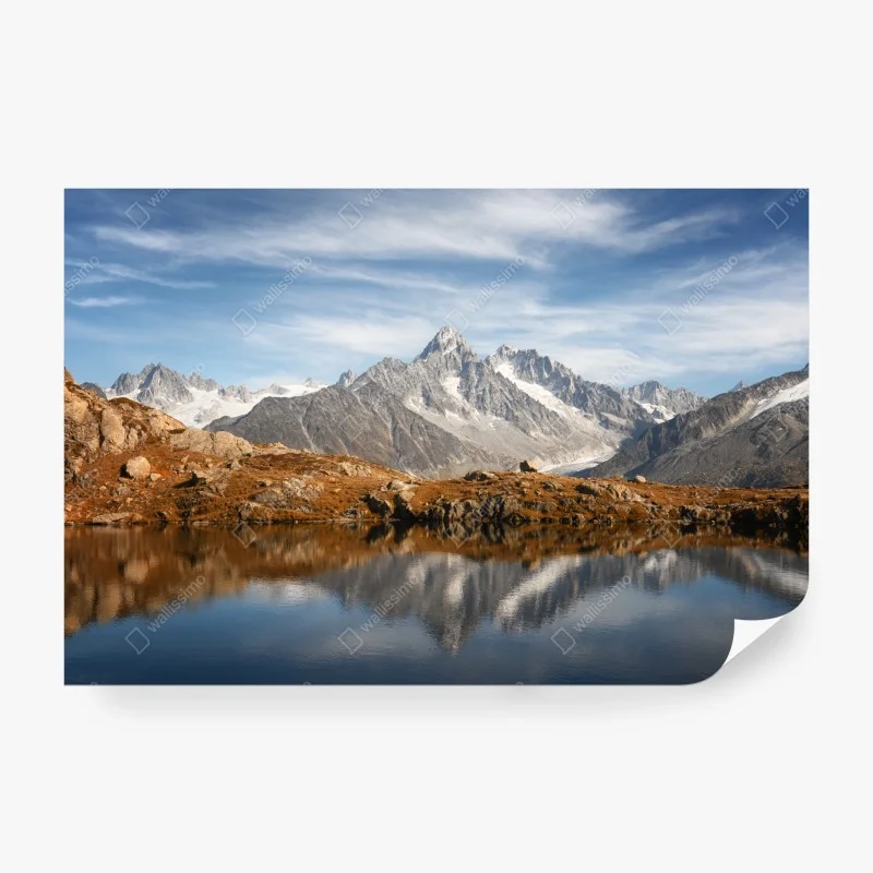 Wall mural tranquil alpine peaks reflected in lake