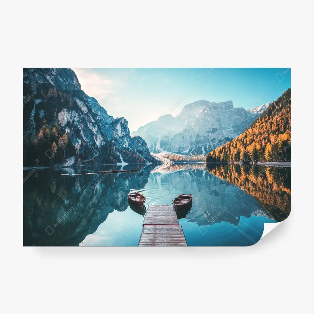 Wall mural sunlit dock at Braies Lake, Dolomites • Wallissimo®