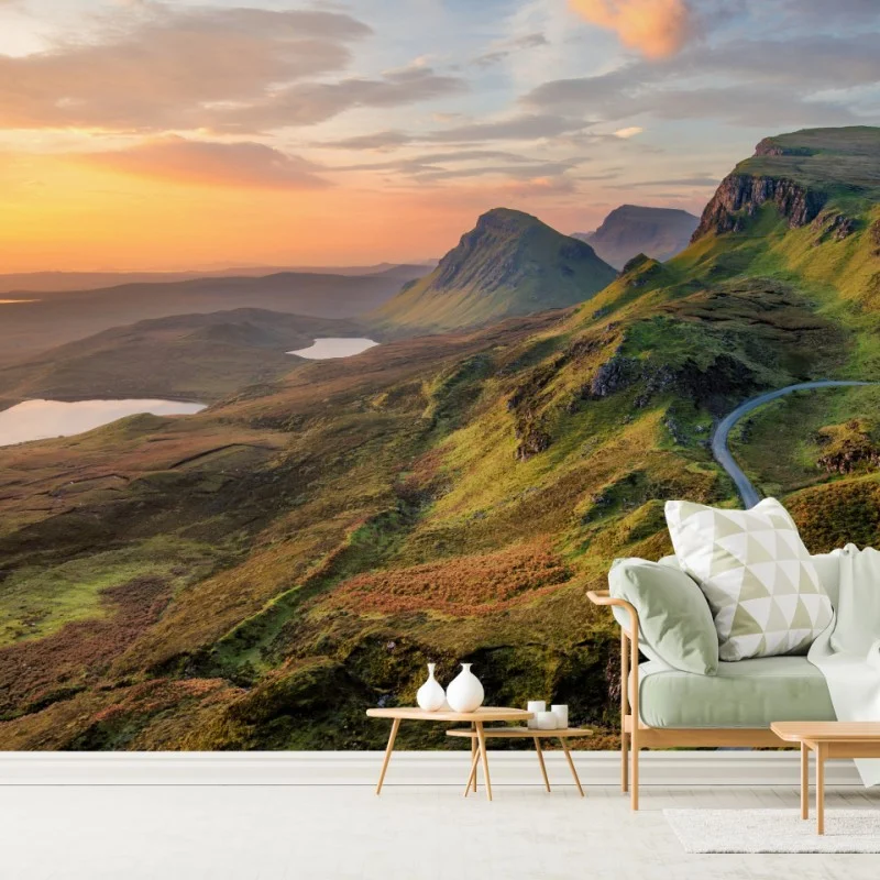 Wall mural sunset over rolling green hills