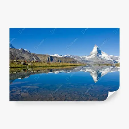 Wall mural alpine mountain reflection over calm lake • Wallissimo®