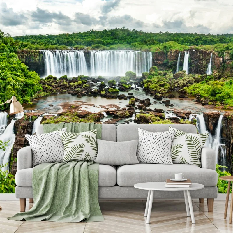 Wall mural lush green waterfall panorama