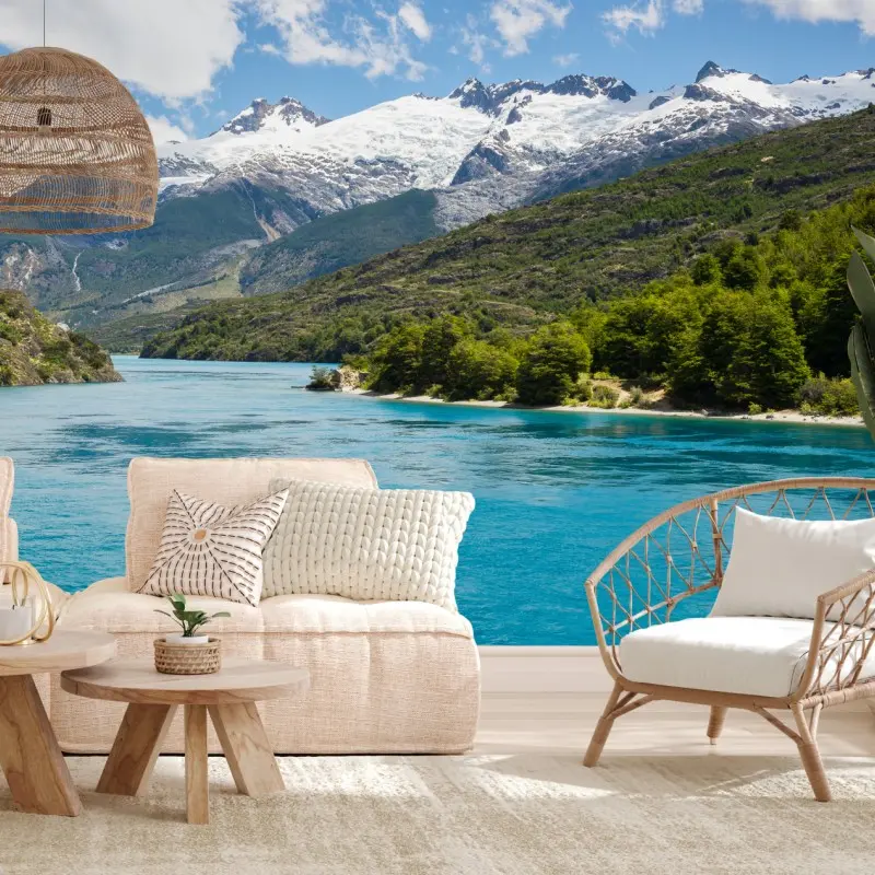 Wall mural turquoise alpine lake with snow-capped mountains