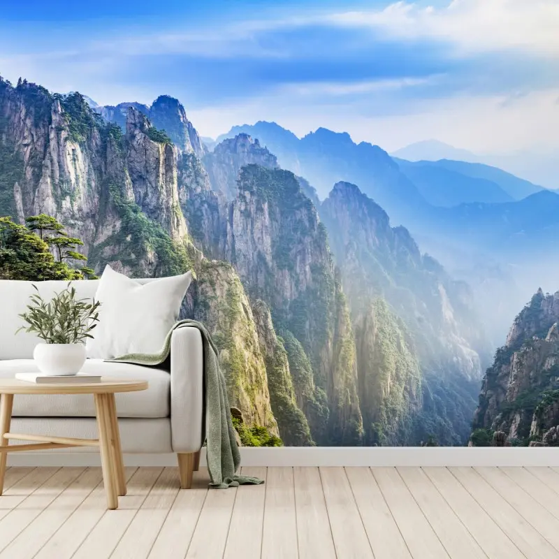 Wall mural misty mountain peaks panorama