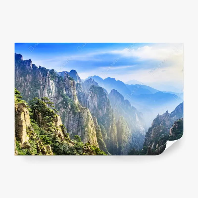 Wall mural misty mountain peaks panorama