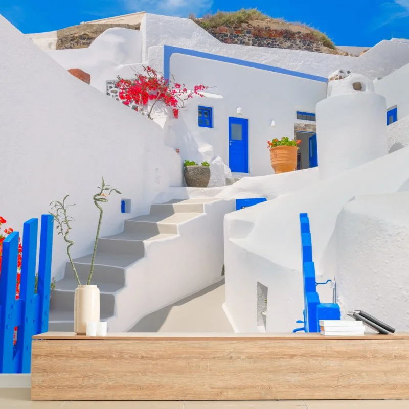 Wall mural Santorini whitewashed houses with blue accents