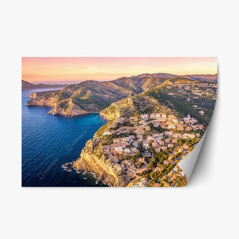 Repositionable sticker sunset coastal landscape over cliffside village