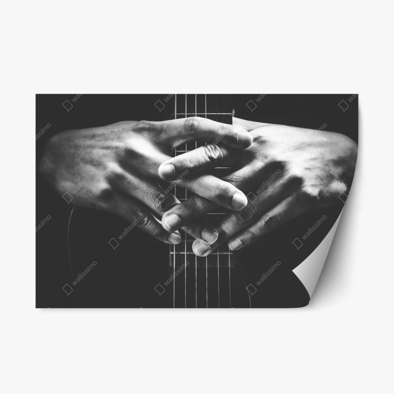 Repositionable sticker intertwined hands on guitar strings