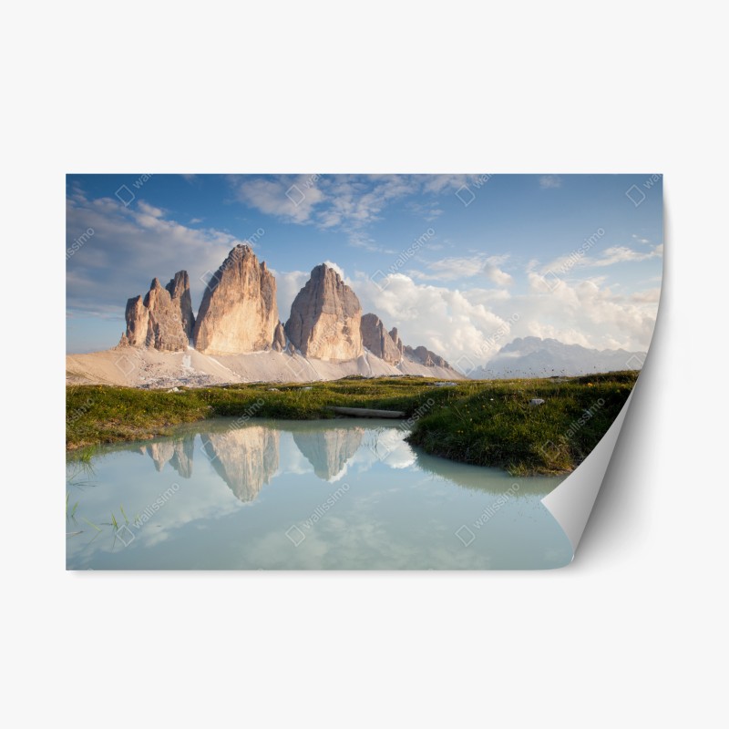 Repositionable sticker sunlit alpine peaks reflected in a tranquil lake