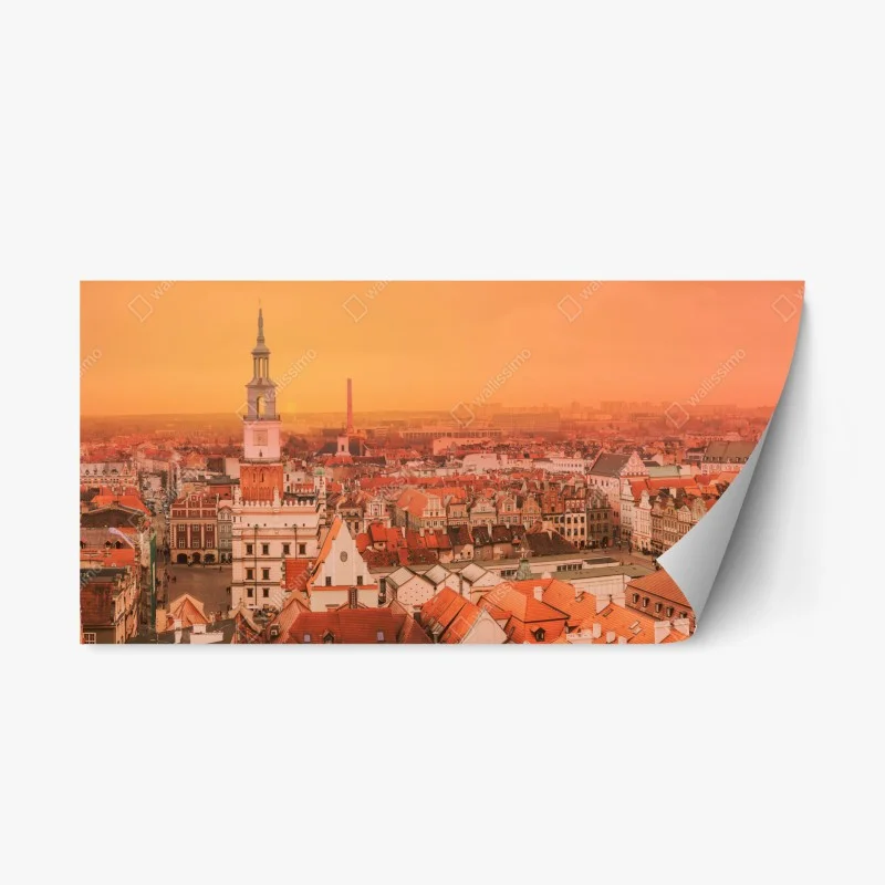 Repositionable sticker warm sunset over historic city rooftops