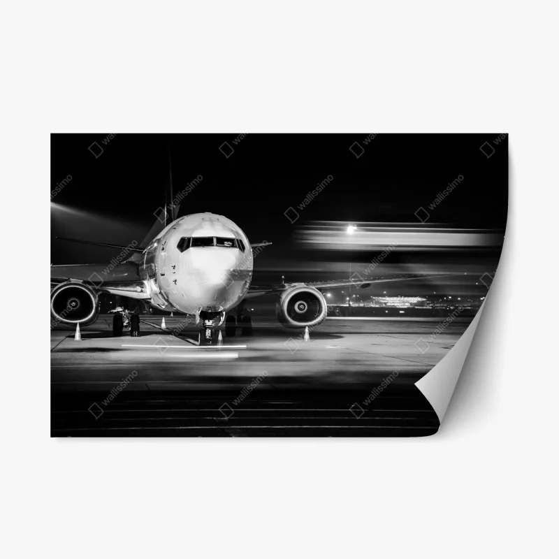 Repositionable sticker monochrome jet on the tarmac at night