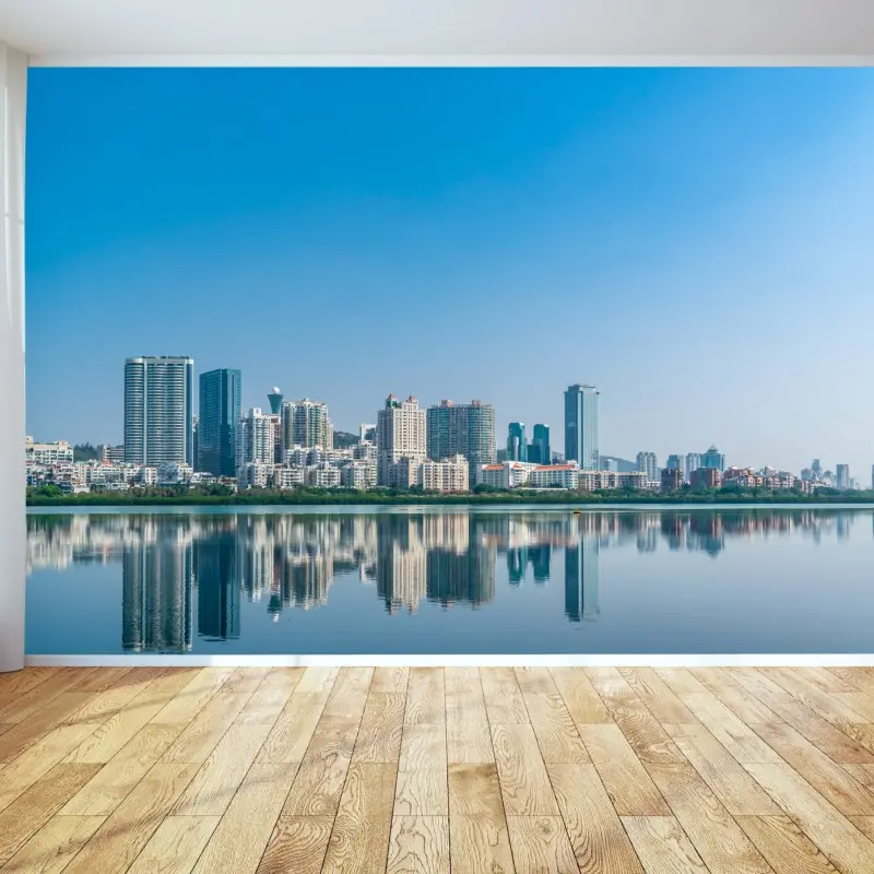Wall mural calm city skyline reflection over water